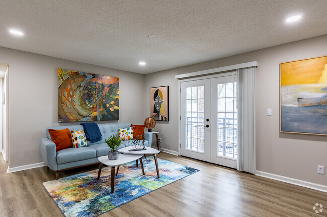 Sala de estar de 2BR, 1BA y 909SF - Spring Chase Apartments