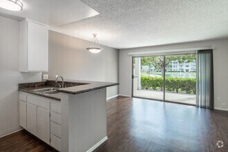 Studio, 1BA - Alsace - 541SF - Kitchen and Living Room - Versailles on the Lake Apartments