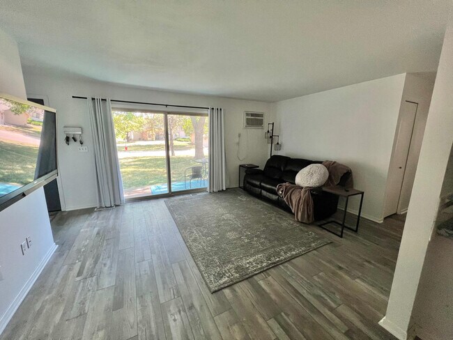 Living Room with huge patio walkout - 8850 Jasmine Ln