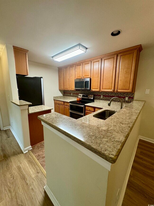 Foto del edificio - 4665 Fringetree Dr