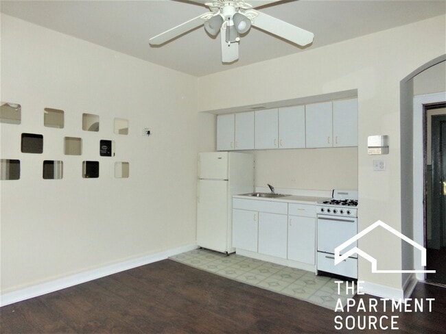 Building Photo - 6916 N Lakewood Ave