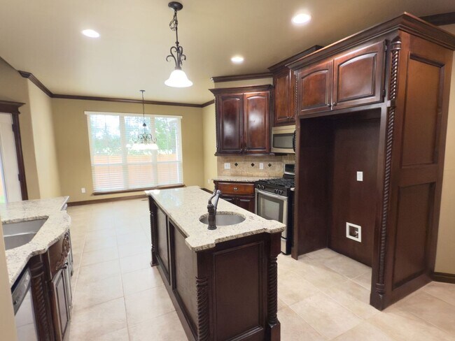 Building Photo - Lots of Space + Storage! Storm Shelter! Be...