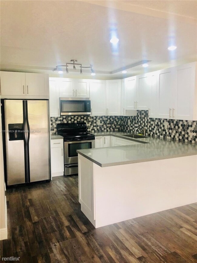 Building Photo - 3 br, 2 bath House - 8810 SW 132nd Pl # 404DN