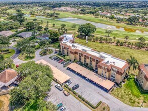 Building Photo - 5350 Woodland Lakes Dr