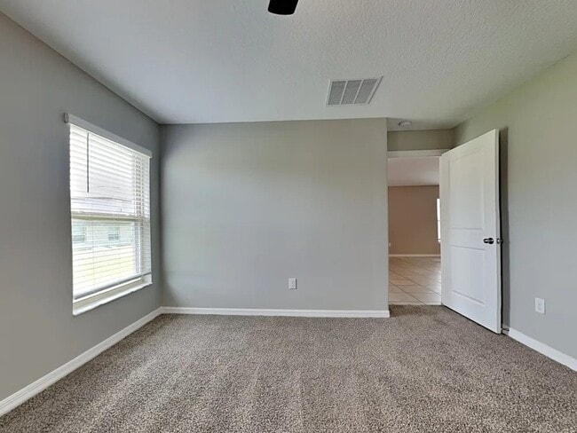 Building Photo - 1615 Blue Rose Dr