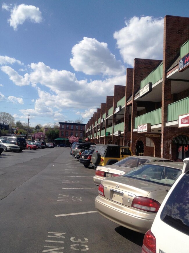 2 spots of unassigned free permit parking. - 22 Trolley Square