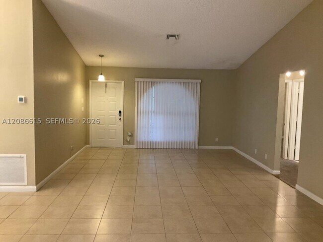 Foto del edificio - 10320 NW 48th Ct