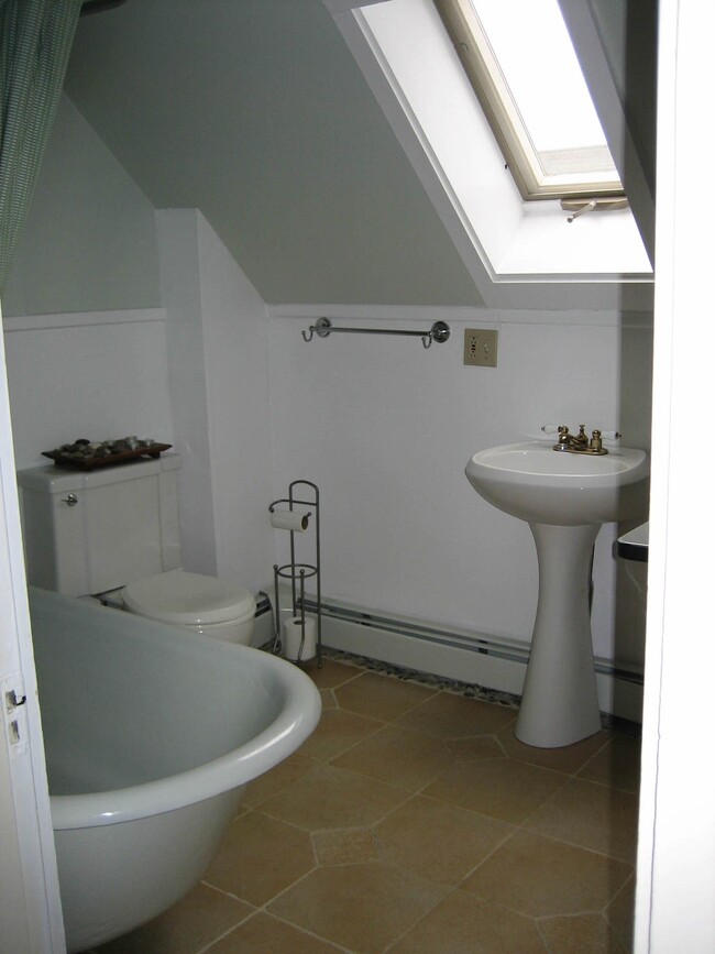 bathroom w claw foot tub - 33 W Elm St