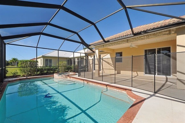 Building Photo - 1902 Coconut Palm Cir