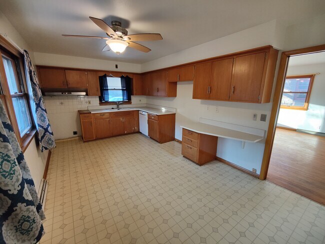 Kitchen with Desk and Dishwasher - 3714 N 84th St