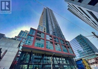 Building Photo - 108-3108 Peter St