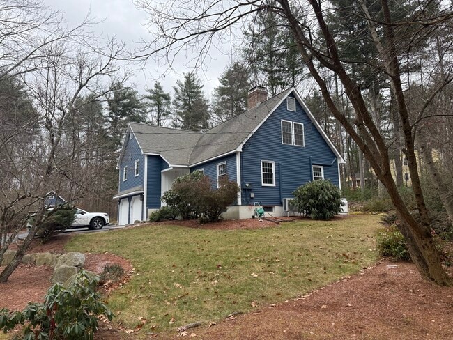 Home side view - 34 Hitching Post Ln