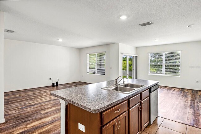 Building Photo - 6381 Trouvaille Pl