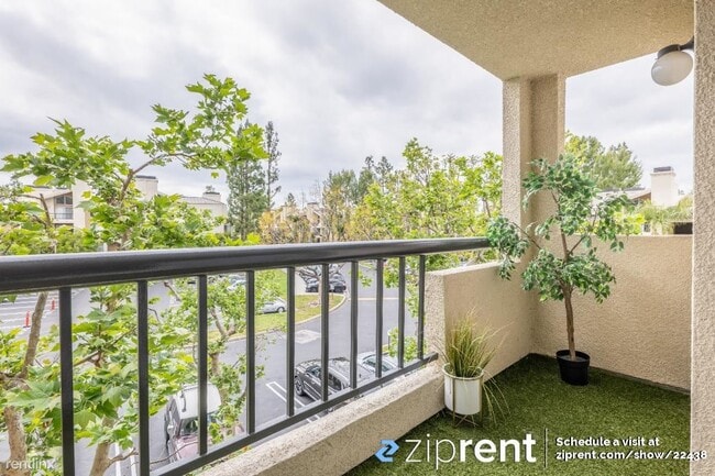 Foto del edificio - 1 br, 1 bath Condo - 5545 Canoga Ave, Wood...