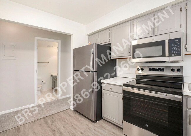 Building Photo - Charming 2-Bedroom Condo in Clinton Twp. –...