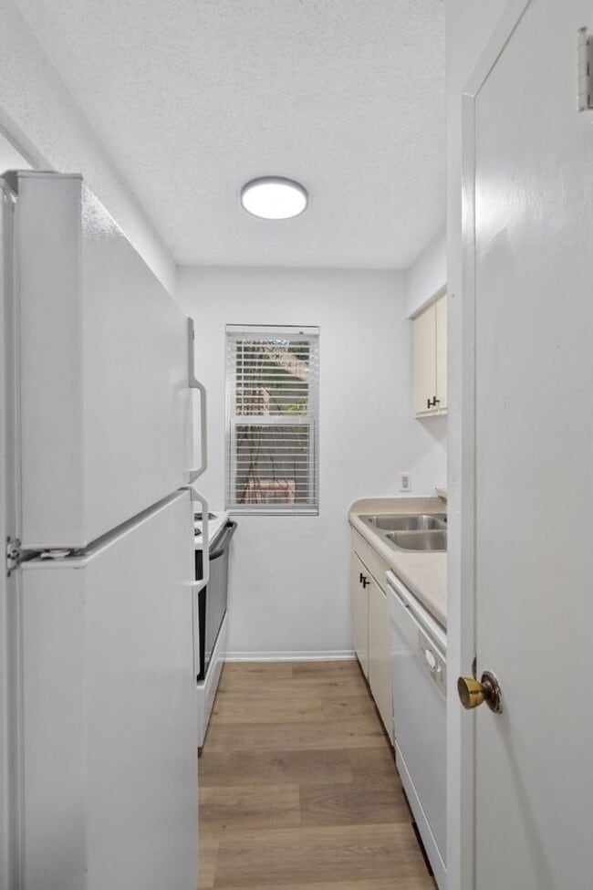 Building Photo - 4105 Speedway, Unit 203