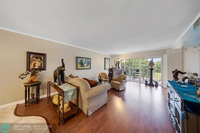 Building Photo - 3150 N Palm Aire Dr