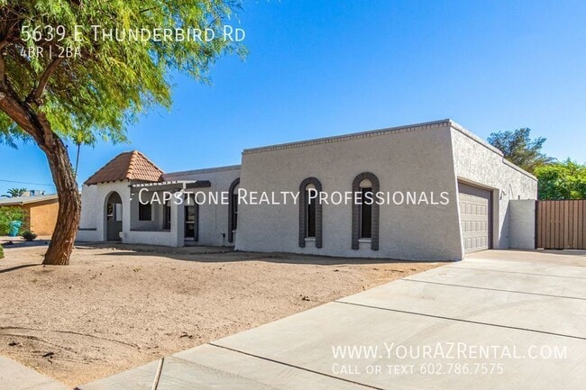 Building Photo - Gorgeous Spanish Styled Home with a Pool!