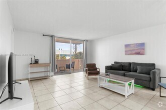 Building Photo - 9440 W Bay Harbor Dr