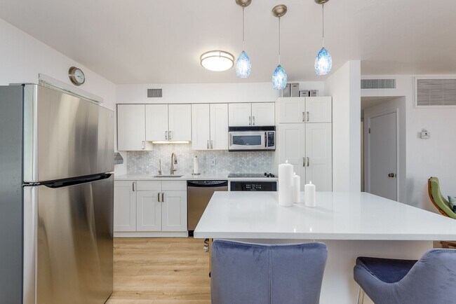 Kitchen with Island - 6815 E 2nd St