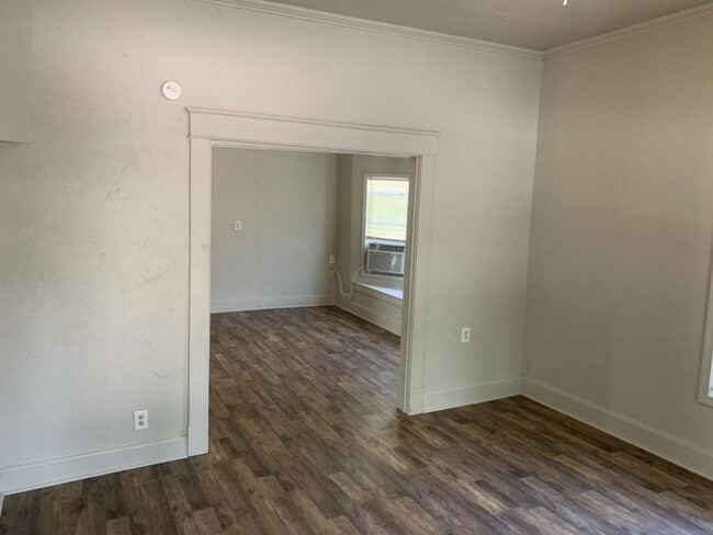 Building Photo - 208 E. Springer