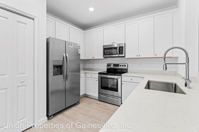 Building Photo - 3 br, 2.5 bath House - 698 NW 126th Terrace