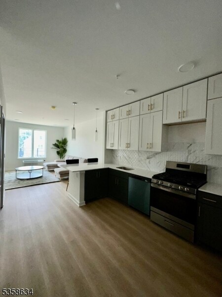 Foto del edificio - 321 E 3rd St