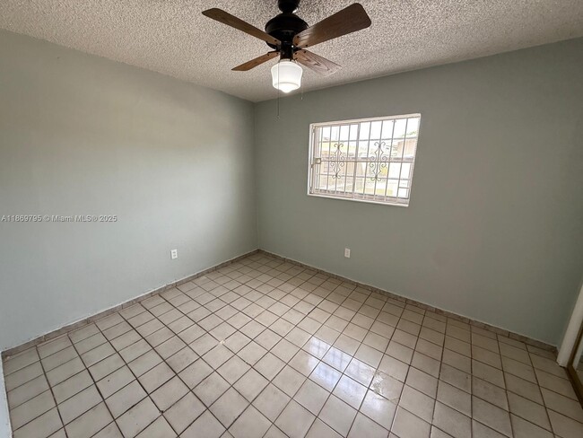 Building Photo - 1281 W 29th St