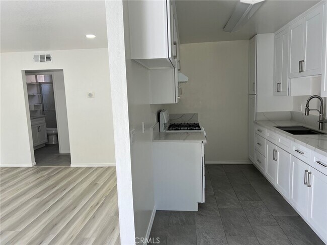 Building Photo - 7039 Remmet Ave
