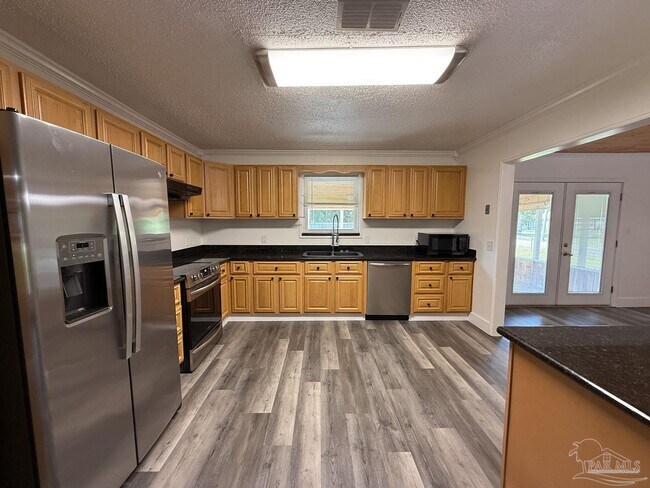 Foto del edificio - 5801 Timberline Dr