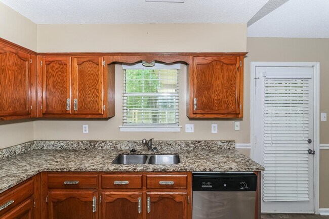 Foto del edificio - 4820 Greenlawn Cove