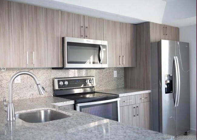 Building Photo - 1401 SW 124th Ct