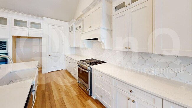 Foto del edificio - 8813 Creekhollow Ct