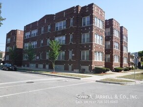 Building Photo - 10853 S Vernon Ave