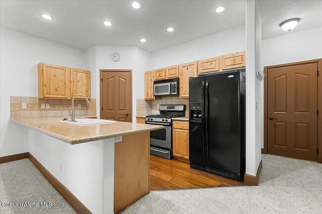 Foto del edificio - 3-Bedroom Townhome with Garage – Prime Coeur d’Alene Location