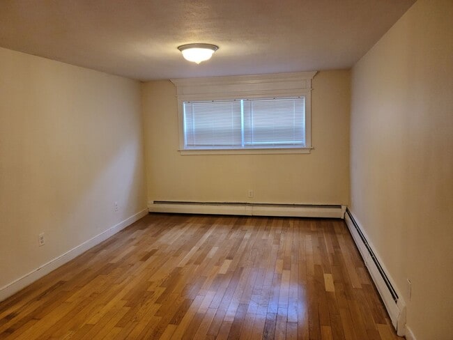 Building Photo - Off Street Parking - Short distance to T stop and Whole Foods - Updated kitchen and bathroom