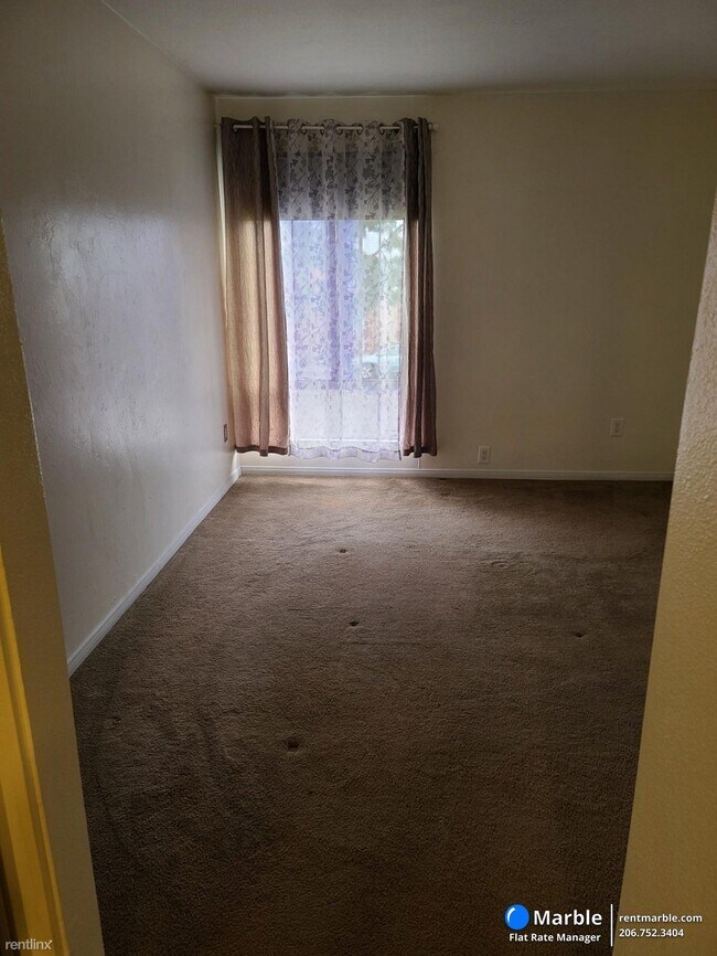 Building Photo - 2 br, 1 bath Condo - 7737 Margerum Ave Uni...