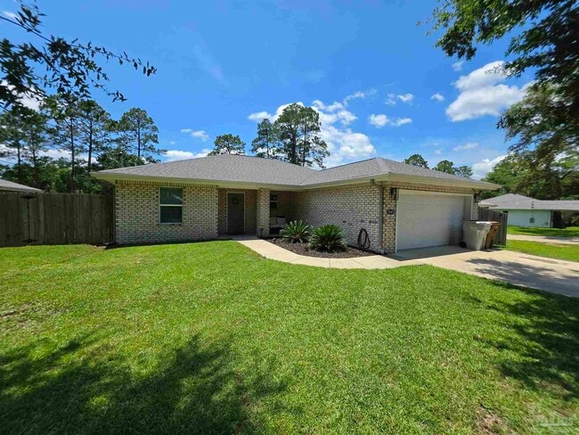 Building Photo - 5565 Riviera Dr