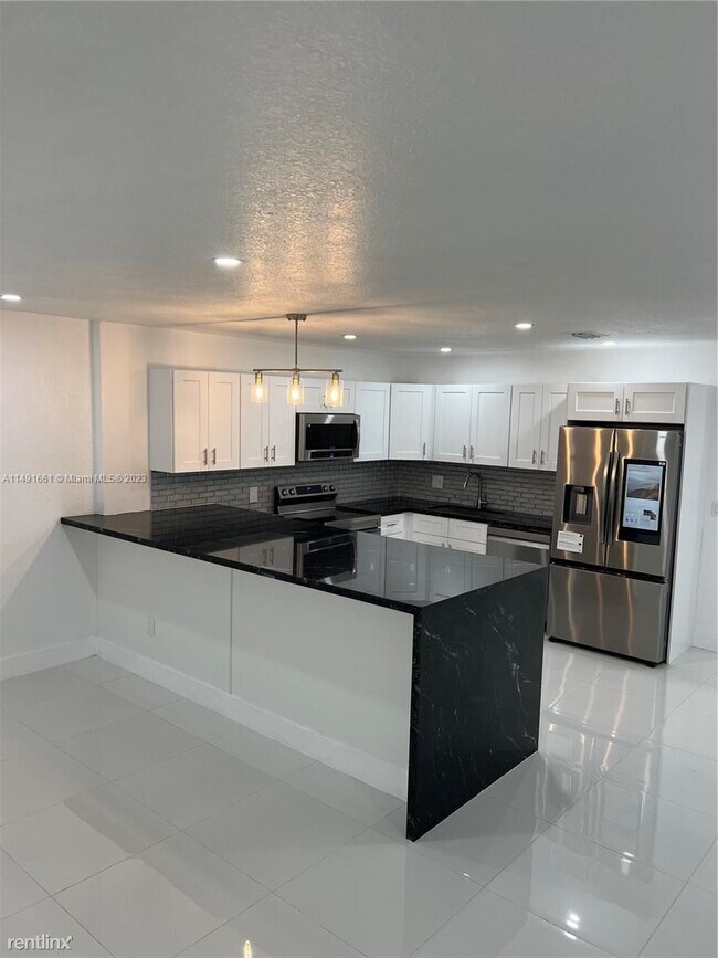 Foto del edificio - 4 br, 3 bath House - 2010 NW 60th Ave # 2010