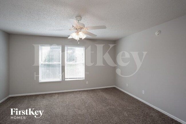 Building Photo - 9381 West Quarter Moon Drive