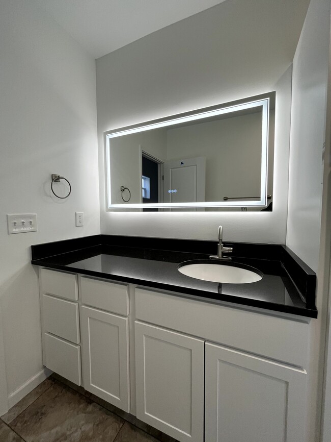 Bathroom Vanity & Mirror - 1207 Broadway