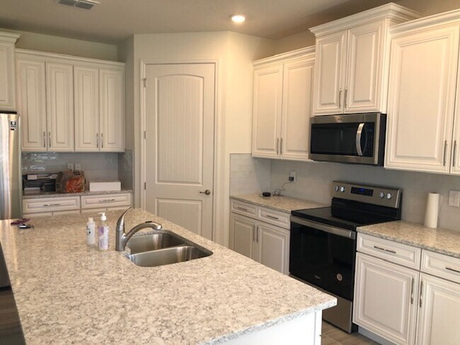 Building Photo - ALMOST NEW 4 BDRM home in GATED ROSECREST!