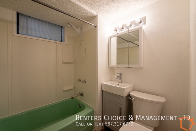 Building Photo - Nicely Updated Basement Suite with Private Laundry + Shed Storage