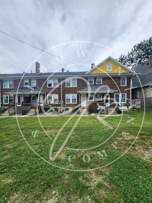 Primary Photo - "Charming 2-Bedroom Townhouse on East Broa...