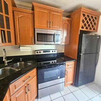 Building Photo - 5460 W 21st Ct