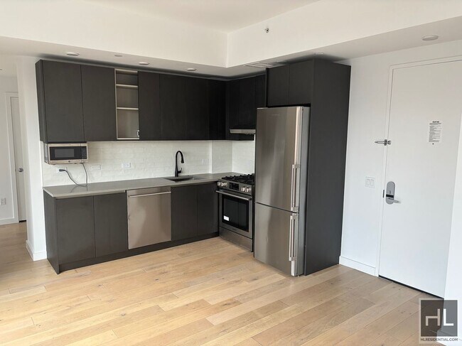Building Photo - Northern Blvd | Flushing | 2BR/1BA w/Private Terrace, W/D & NO Broker's Fees!