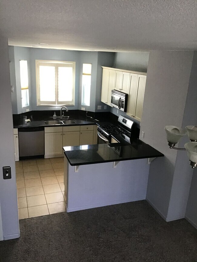Building Photo - 3 Story, 2 bedrooms, 3 bathrooms with a De...
