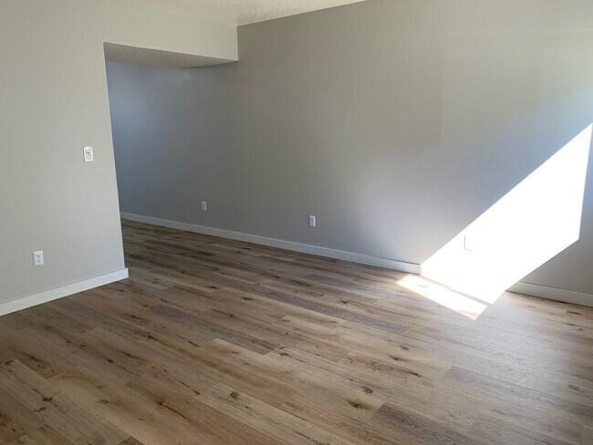 Sala de estar - Riverside Apartments and Townhomes