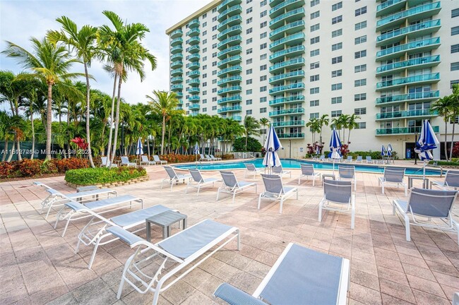 Building Photo - 19370 Collins Ave