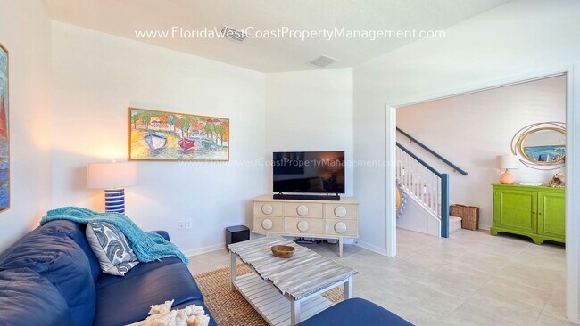 Building Photo - EXCEPTIONAL AND SPACIOUS FURNISHED TOWNHOME WITHIN WATERSIDE- NAUTIQUE!